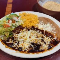 Skirt Steak with Cheese and Mole Dinner · Served with rice, beans, salad and tortillas.