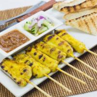5. Thai Satay · 6 pieces. Served with choice of protein, marinated in coconut milk and Thai spices, then ske...