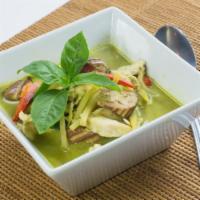 2. Green Curry · Green curry made with fresh chili with eggplant, bamboo shoots, Thai basil, bell peppers and...