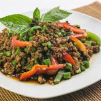 1. Pad Kra Pow · A spicy combination of bell peppers, green beans, Thai chili, and Thai basil and choice of m...