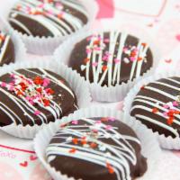 Chocolate Dipped Oreo · Traditional Oreos covered in dark chocolate, drizzle and sprinkled with fun festive colors.