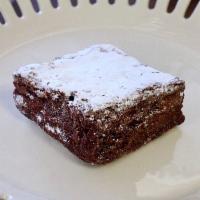 Brownie · Fudgey brownies with a powdered sugar coating on top, made with premium cocoa.