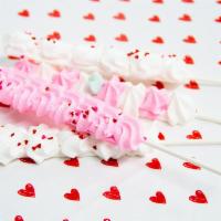 Meringue Pops · Crunchy, light, and airy meringue on a stick. 