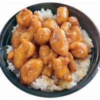 Orange Chicken Rice Bowl  · Orange chicken and veggies on a bed of white rice