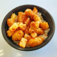 Crispy Sweet Chili Rice Bowl · White rice with sweet chili flavored chicken.