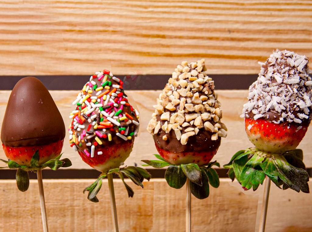 Strawberry Dippers · Strawberry dipped in chocolate and topping of your choice: plain, coconut, peanuts, or sprinkles.