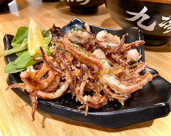 Ika Geso Kara-age 唐扬鱿鱼丝 · Fried squid tentacles.