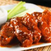 Chicken Wings · Served with your choice of sauce.