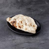 Naan · Soft white flour bread freshly baked in clay oven (tandoor).