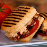 Chicken Sun-Dried Tomato Panini · Grilled chicken, tomatoes, romaine lettuce, provolone cheese, chipotle mayo and sun-dried to...