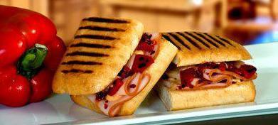Spicy Turkey Panini · Smoked turkey breast, roasted red peppers, crushed red peppers, chipotle mayo, provolone che...