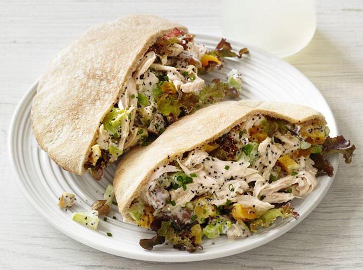 Grilled Chicken Pita · Grilled chicken breast with lettuce, tomatoes, onions and fat-free mayo stuffed in a pita.