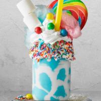 Cotton Candy Milkshake · Blue cotton candy ice cream, mini marshmallows, M&M's, whipped cream, and mallo creme.