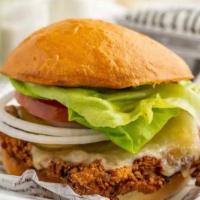 Crispy Buttermilk Chicken · Cheddar, lettuce, onions, house-made ranch, red hot aioli, bread and butter pickles.