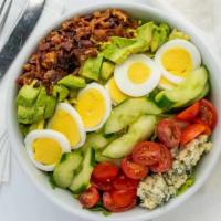 Classic Cobb Bowl · Romaine, hard-boiled egg, crispy bacon, avocado, tomatoes, bleu cheese and cucumber.