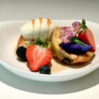 Brioche Bread Pudding · Fresh berries, maple syrup and black walnut ice cream.