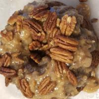 German Chocolate Bundt Cake · The moist chocolate cake paired with coconut pecan filling and buttered/toasted pecans are d...