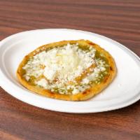Picaditas · A thick handmade tortilla with pinched edges to hold a green or red salsa. Topped with queso...