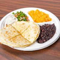Quesadillas · 2 tortillas on top of each other, with meat and cheese inside. Comes with side of rice and b...
