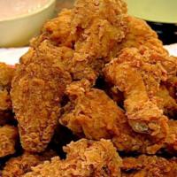 4 Chicken Party Wings · Fried, seasoned chicken wing portions