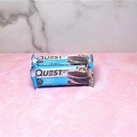 Quest Protein Bar Cookies and Creme · 21 grams of protein.