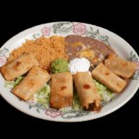 23. Taquitos Rancheros Combo · Traditional Mexican taquitos! 3 crisp corn tortillas filled with shredded beef 