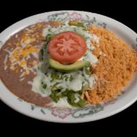 24. Enchiladas Suizas Combo · Authentic enchiladas with filling prepared with sauce of fresh Mexican tomatillos, green pep...