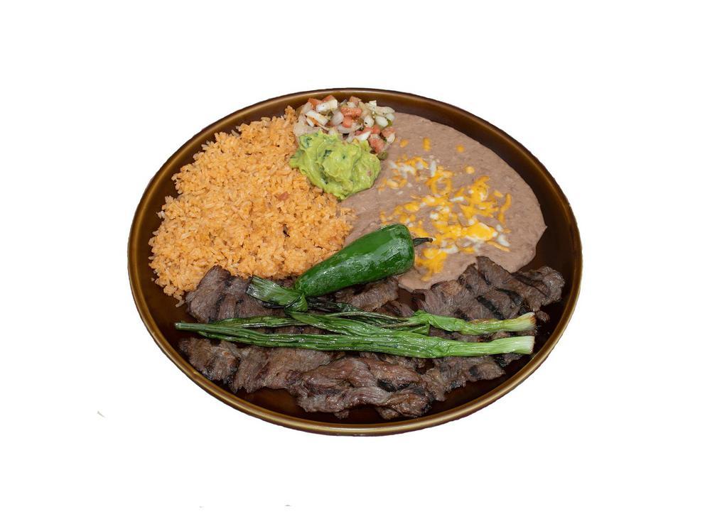 Carne Asada · Premium skirt steak, flame broiled to customers preference. Served with rice, beans, pico de gallo and guacamole.