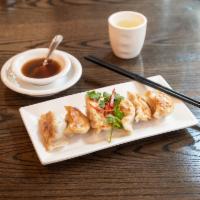 7. Pan Fried Pork Dumplings  · Filled dough. (5)