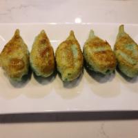9. Pan Fried Vegetable Dumplings  · Filled dough. (5)