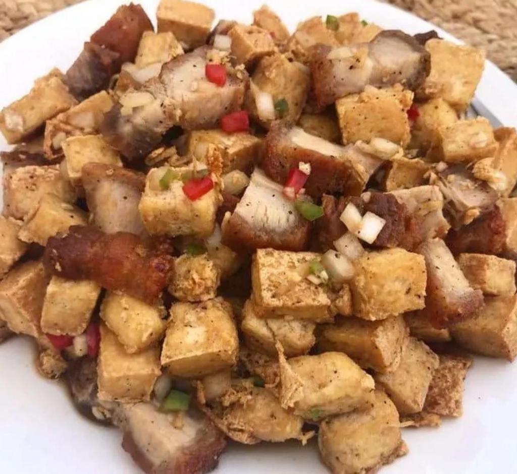 Tokwa't Baboy · Deep-fried tofu, braised pork ear, soy sauce, and onion.