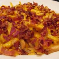 Bacon&cheese fries · 10 ounce Served with ketchup