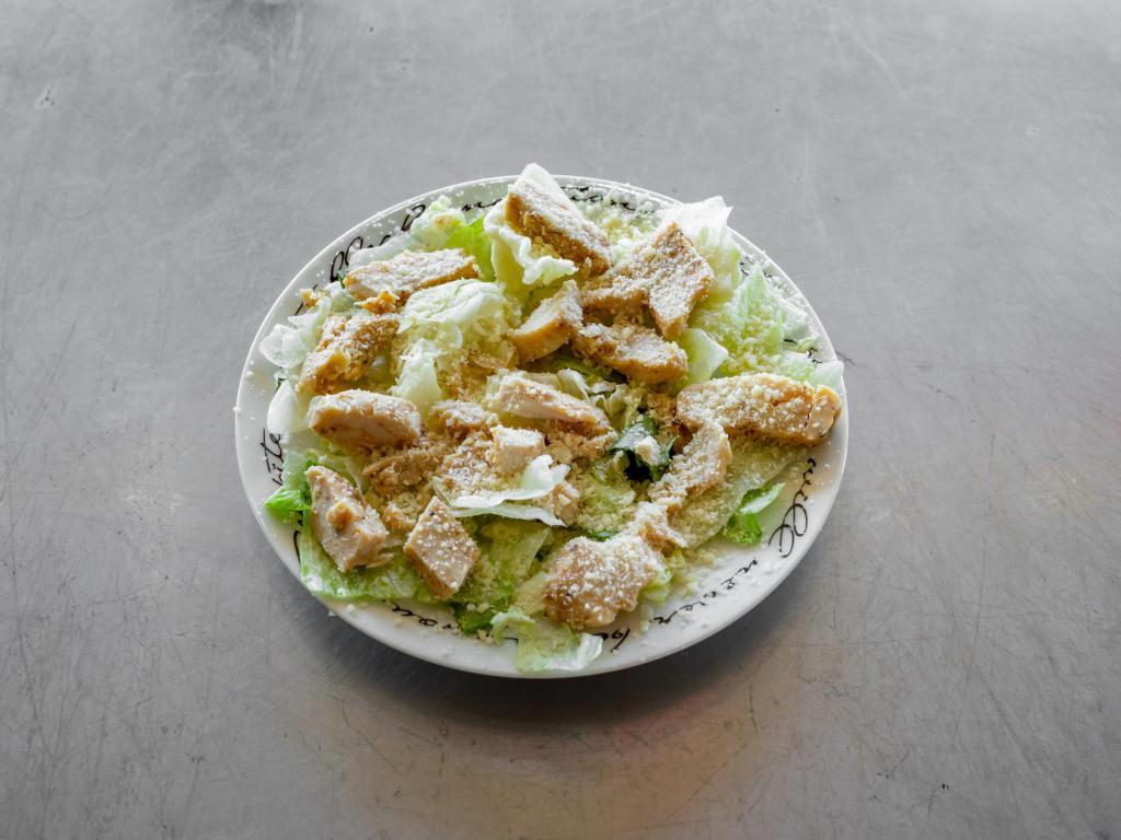 Chicken Caesar Salad · Tossed salad `lettuce with Parmesan cheese, grilled chicken and Caesar dressing.