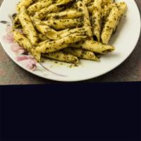 Penne pesto · Penne noodles mixed with our homemade delicious pesto sauce topped with mozzarella cheese