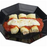 Cheese Manicotti Dinner · Pasta stuffed with ricotta, Parmesan and mozzarella, baked with marinara, topped with mozzar...