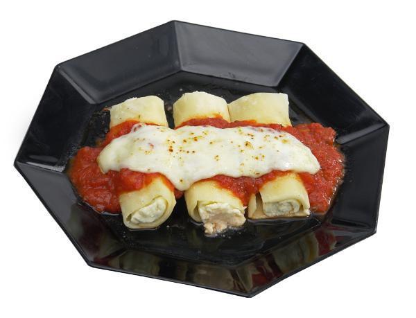 Cheese Manicotti Dinner · Pasta stuffed with ricotta, Parmesan and mozzarella, baked with marinara, topped with mozzarella. Served with hot fresh baked bread sticks and side salad.