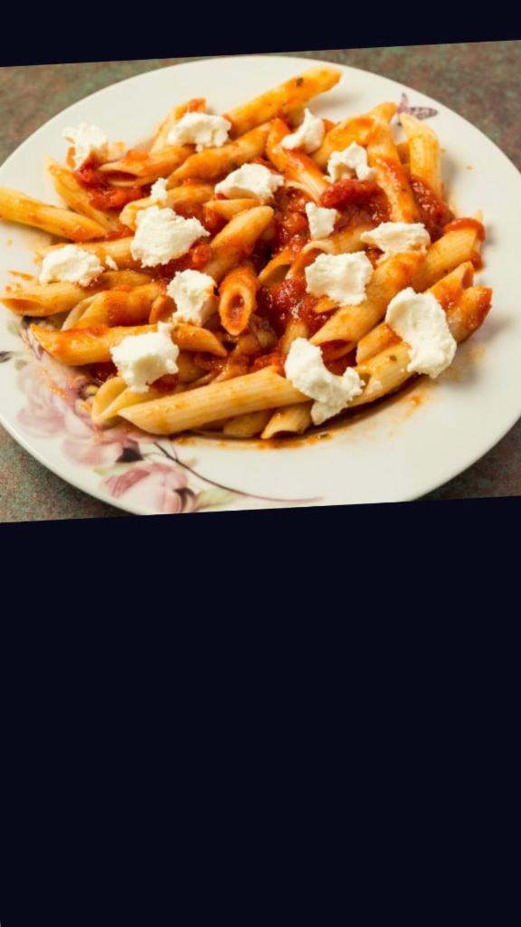 Baked Ziti Dinner · Marinara sauce served over penne, topped with ricotta and mozzarella. Served with hot fresh baked bread sticks and side salad.