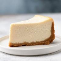 Cheese Cake · New York style cheesecake on top of a graham cracker crust. Served plain.