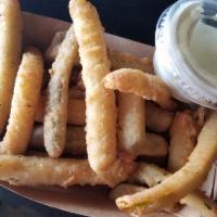 Pickle Fries · Breaded pickle strips served with ranch.