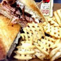 Turkey Melt Sandwich · Toasted with turkey, bacon and mayo on Texas toast with your choice of Swiss, cheddar or Ame...