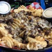 Teriyaki Cheesesteak Fries Platter · Waffle fries covered in Swiss cheese, grilled Philly meat, and sauteed bell peppers and onio...