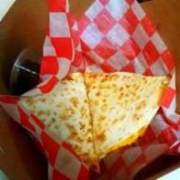Kids Quesadilla · A grilled tortilla filled with cheddar, served with salsa.