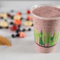 PB-&-J Smoothie · Peanut butter, strawberries, blueberries, bananas, and agave blended with housemade almond m...