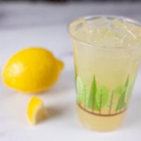 Ginger Lemonade · A thirst-quenching beverage served over ice. Made with cold-pressed lemon juice, organic raw...