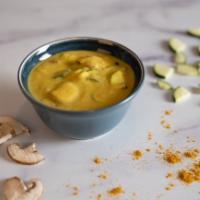 Coconut Curry Soup · Made with fresh young Thai coconut meat, warming spices, and fresh zucchini and mushrooms.  ...