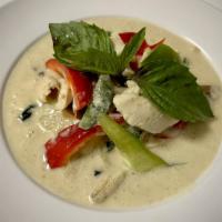 Green Curry  · Fragrant green curry with bell pepper, bamboo shoots,
basil, baby corn, and mushroom
