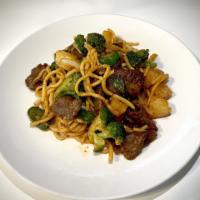 Spicy Noodles · Stir fried Lo mien noodles, onion, green onion, pineapple, basil leaves, broccoli
and jalape...