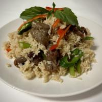 Basil Fried Rice · Spicy fried rice with hot peppers, bell pepper, bamboo shoots, onion, green onion, and basil...