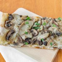 Vegan Funghetto Pizza · Cremini Mushrooms, Porcini Mushrooms, Truffle cream and Parsley. 