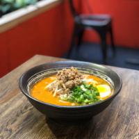 Tantan Ramen (Spicy) · Spicy sesame broth, marinated ground pork, bean sprouts, scallions, & half a soft boiled egg